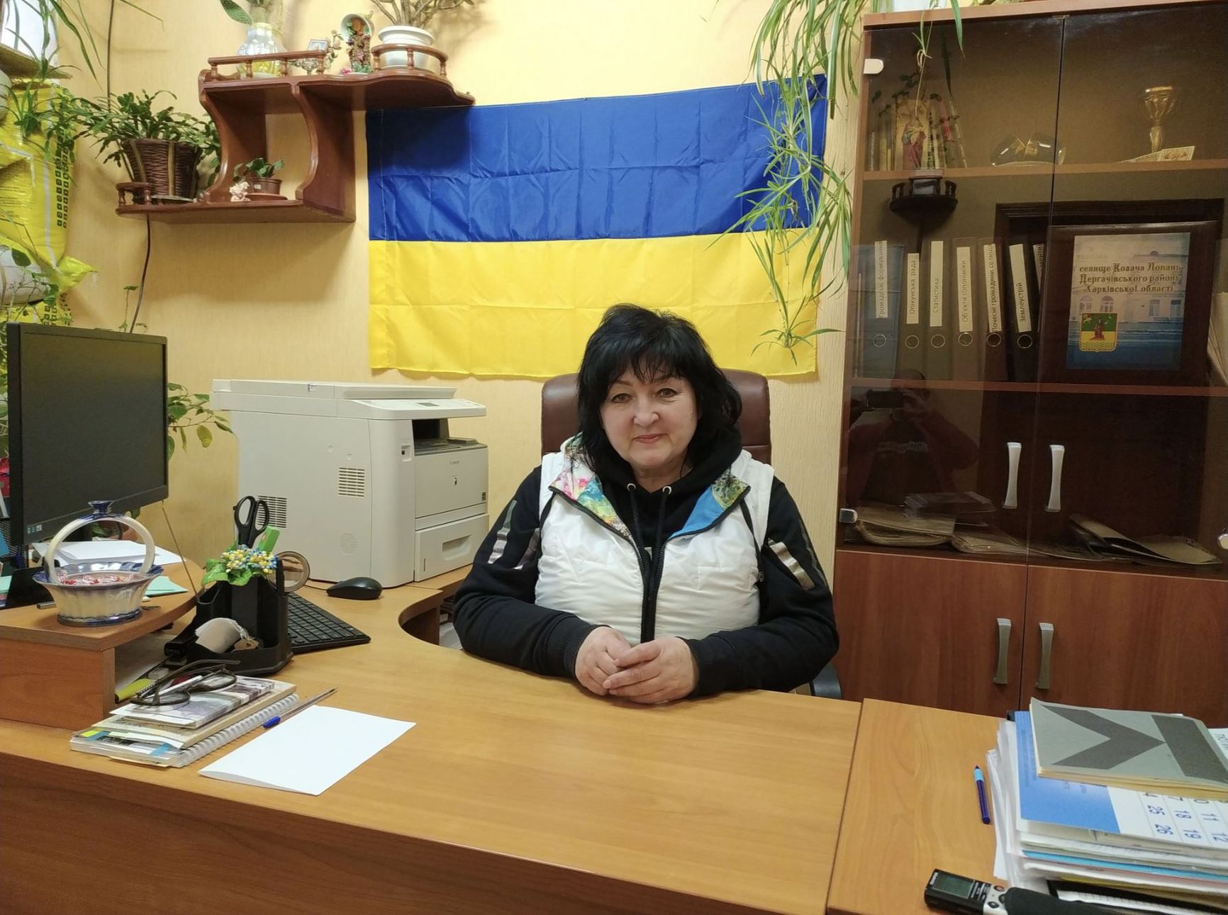 Lyudmila Vakulenko, village head, in her office. The building is called the village council, although after the reform, Kozacha Lopan became part of the Derhachi territorial community.