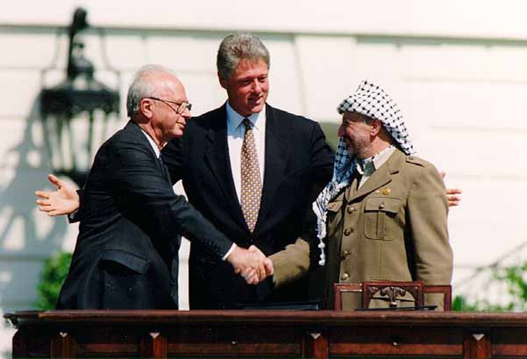 Yitzhak Rabin, Bill Clinton, and Yasser Arafat, September 13, 1993. Washington, D.C.
