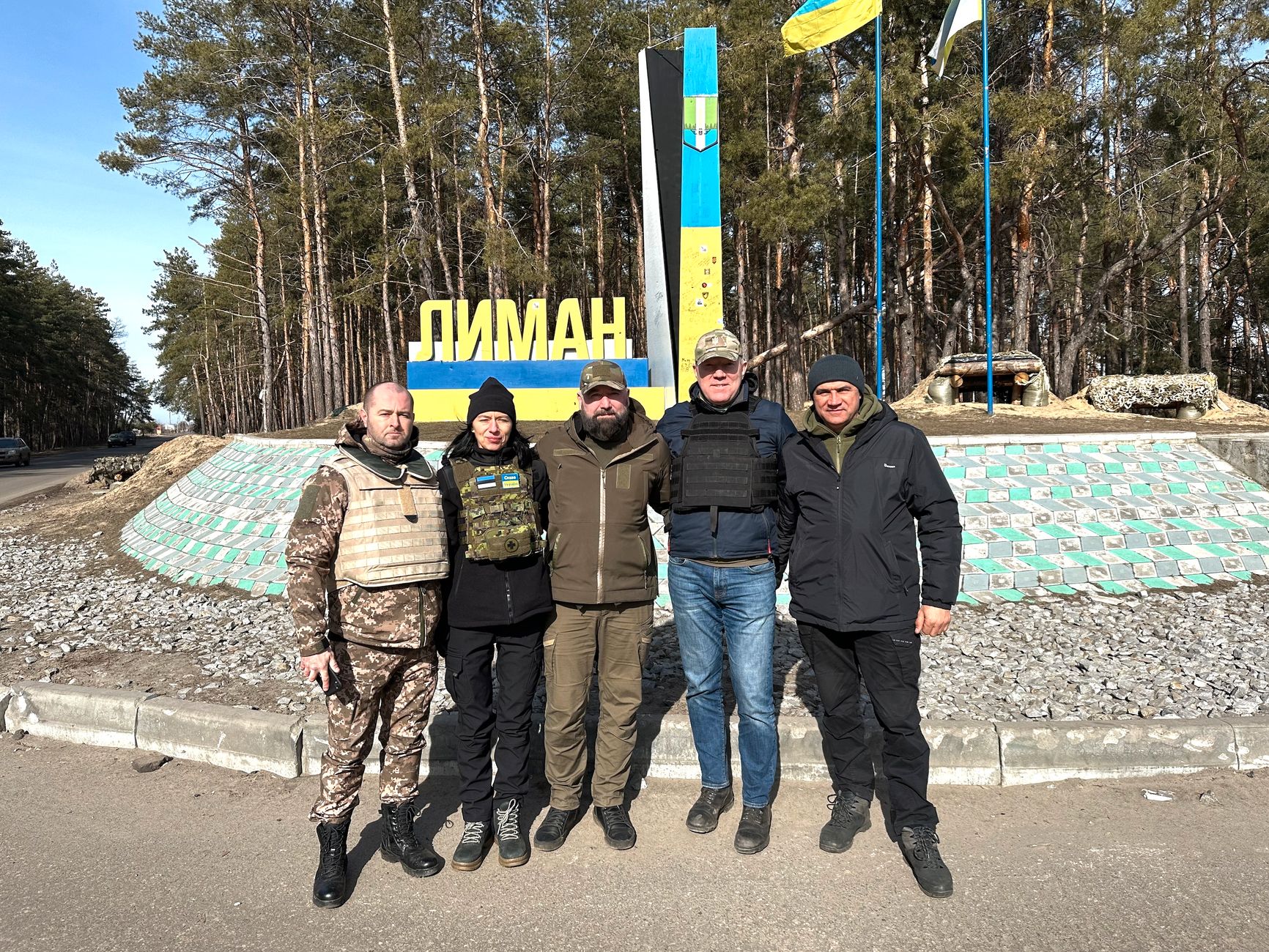 From left to right, Kolk’s husband, Kolk, Dmitro Drey, Mihkelson, and another volunteer outside of Lyman, approximately 12 km behind the front line