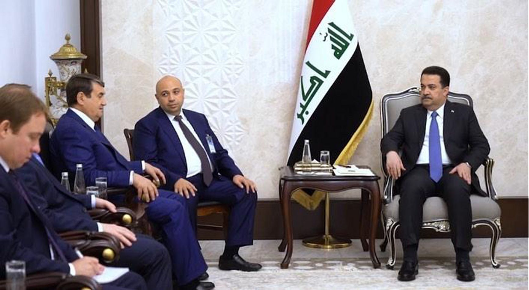 Kharchenko (far left) and the rest of the Russian delegation, including Levitin, meeting with the Iraqi Prime Minister Mohammed Shia' Al Sudani, November 2023.