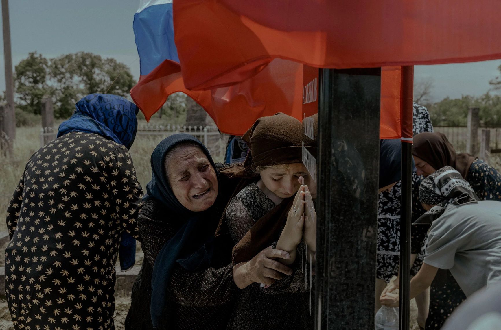 Women mourn the death of their family member and conscript soldier Gasanbek Agabekov, who was killed in Ukraine the 27th of May, in Aglobi, Dagestan, Russia, on June 16. In Dagestan, family members of the deceased meet at regular intervals to grieve. An imam said that fifteen other men from Gasanbek’s area had died in the war. The republic that has seen the highest number of casualties in the war in Ukraine is also one of poorest republics in Russia.