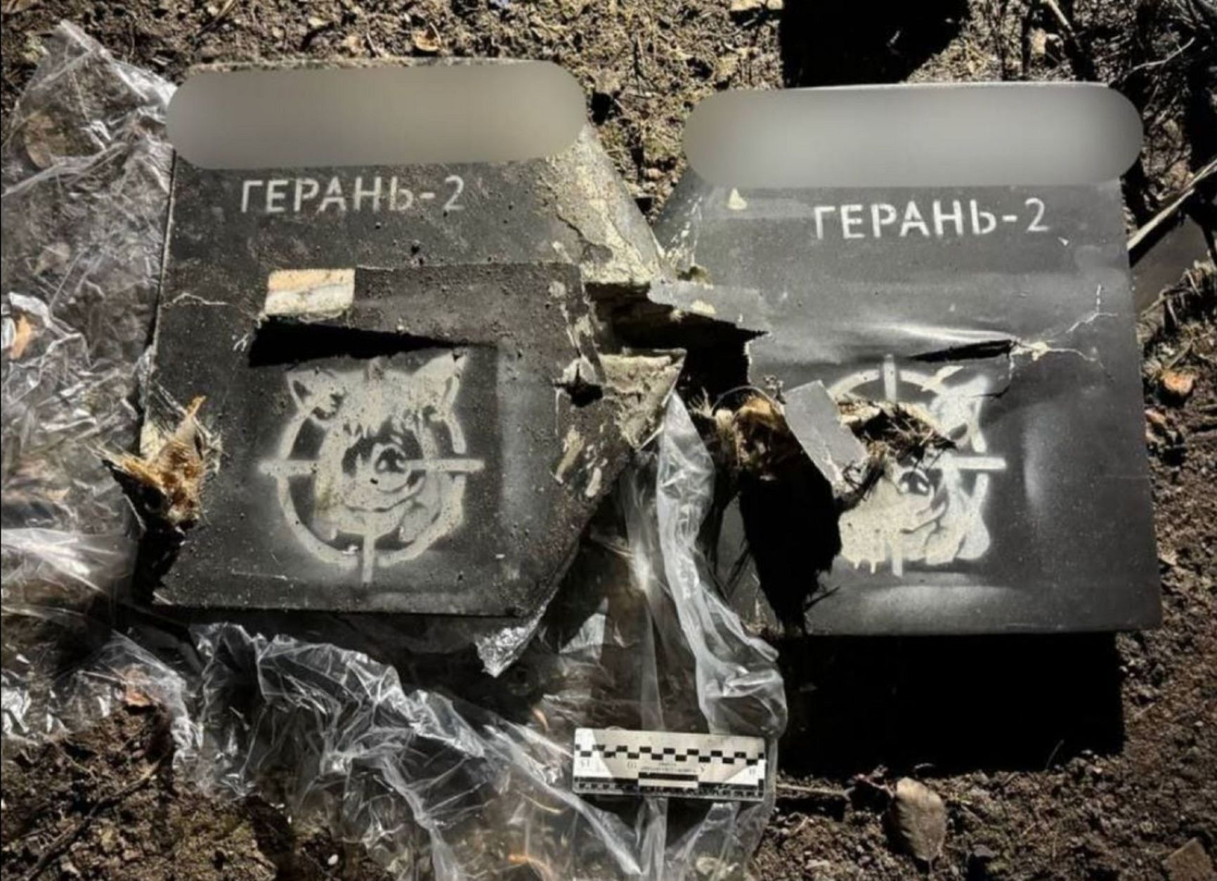 Debris of Shahed-type drones with graphic messages from Russian servicemen.