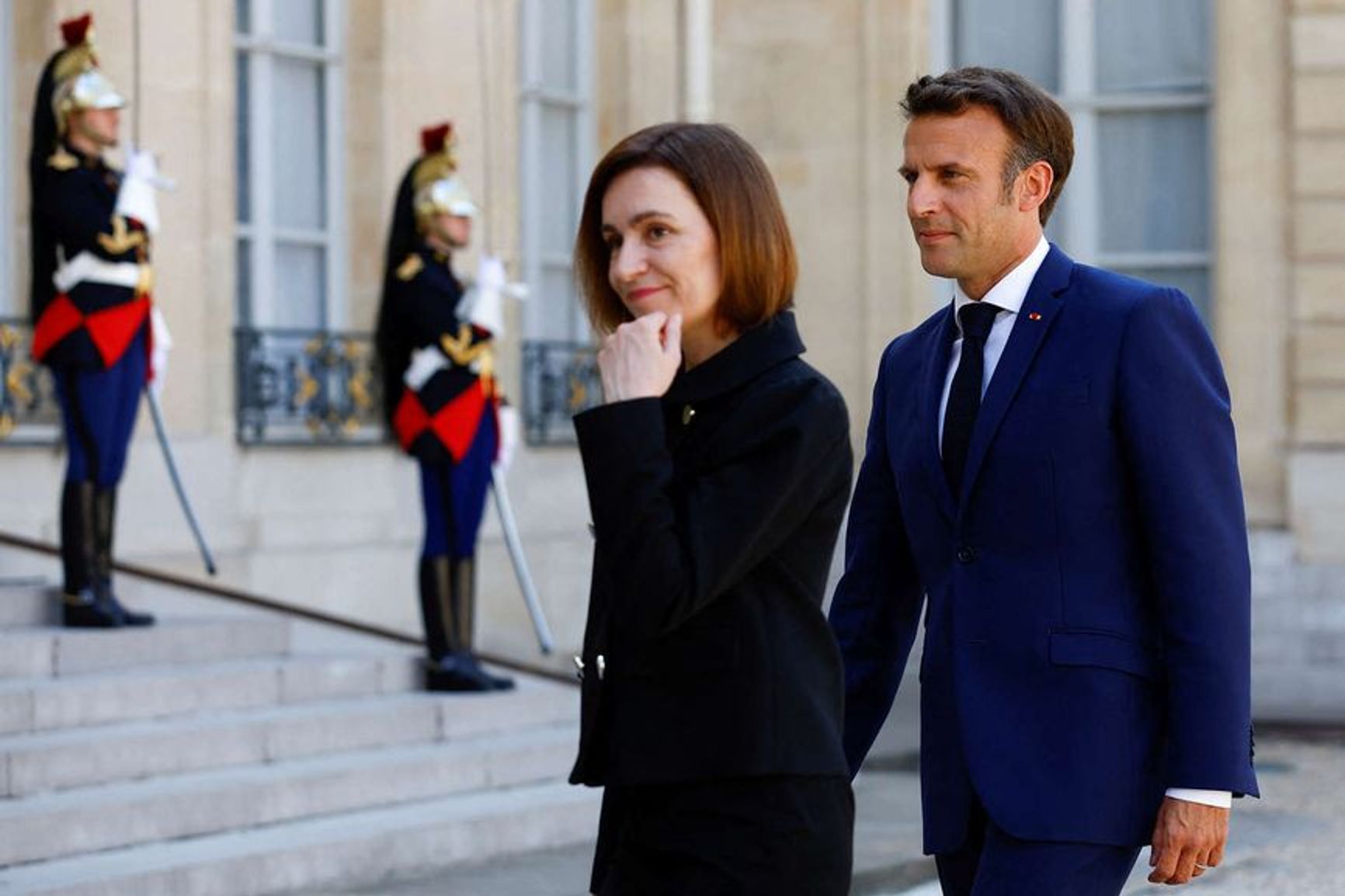 Emmanuel Macron welcomes Maia Sandu before a meeting at the Elysee Palace in Paris, France, May 19, 2022