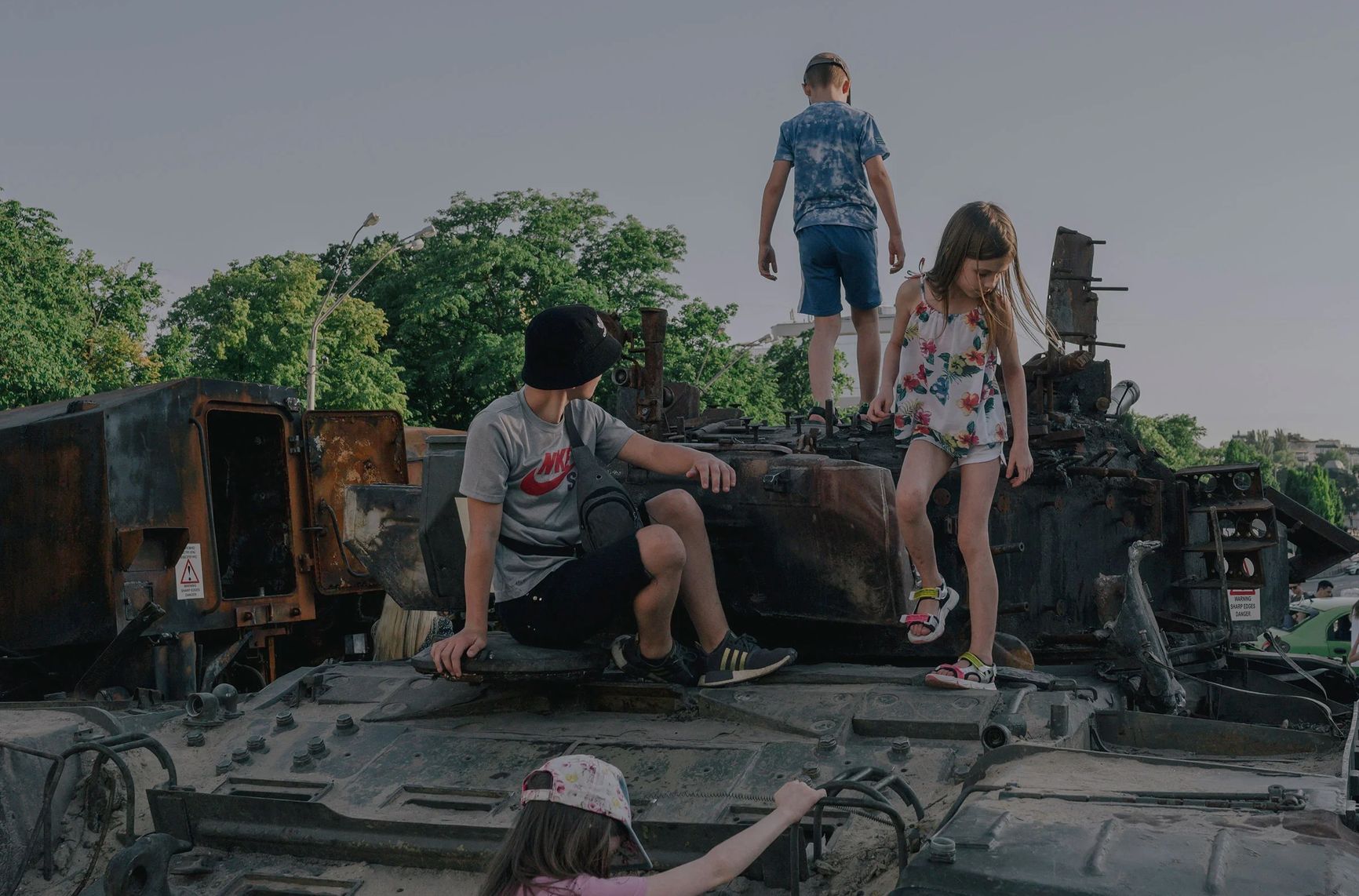 Children play on destroyed Russian war equipment in front of St. Michael‘s Monastery in Kyiv, Ukraine, on June 12.