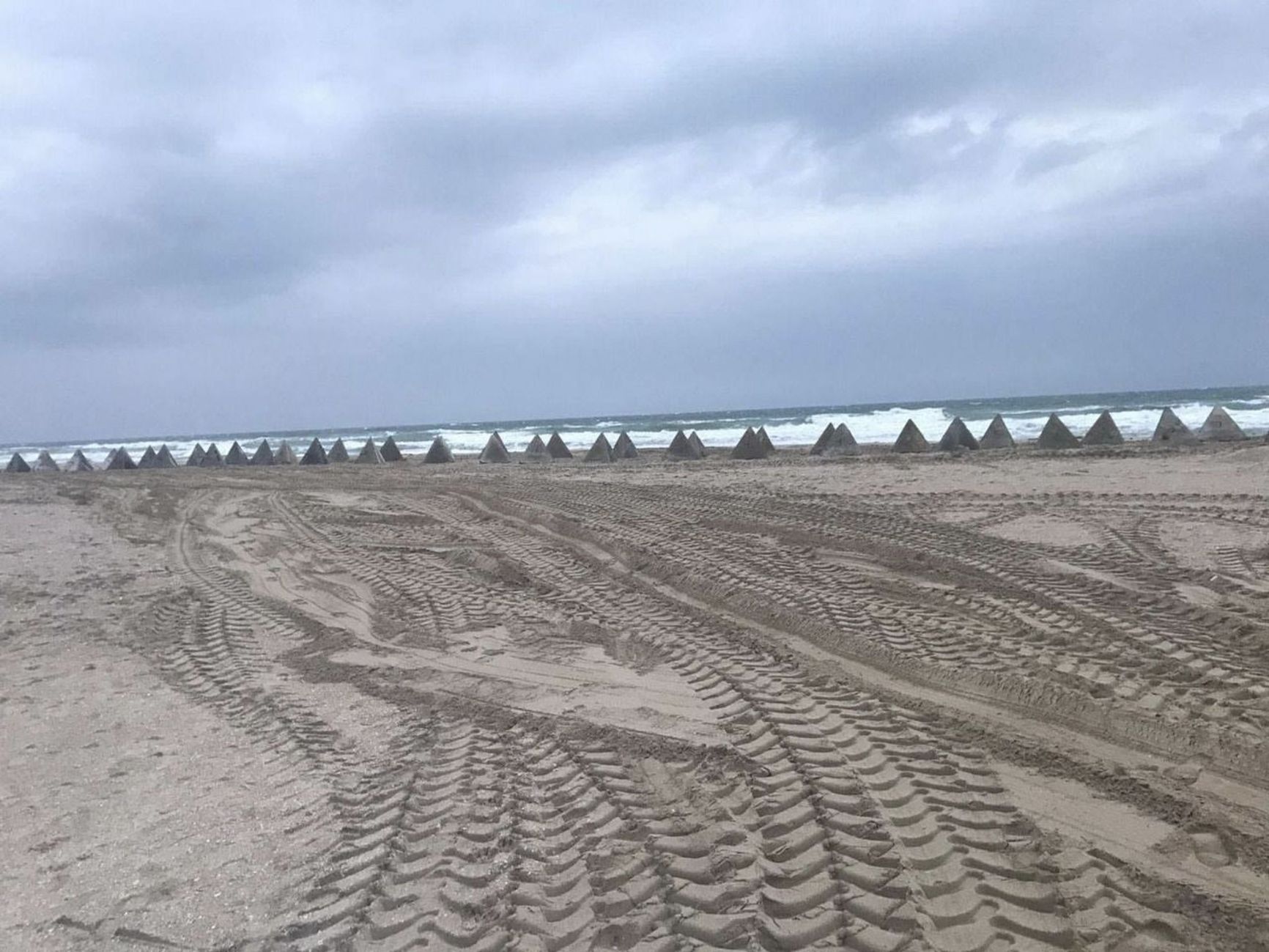 Concrete barriers, aka “dragon's teeth”, on one of the Crimean beaches