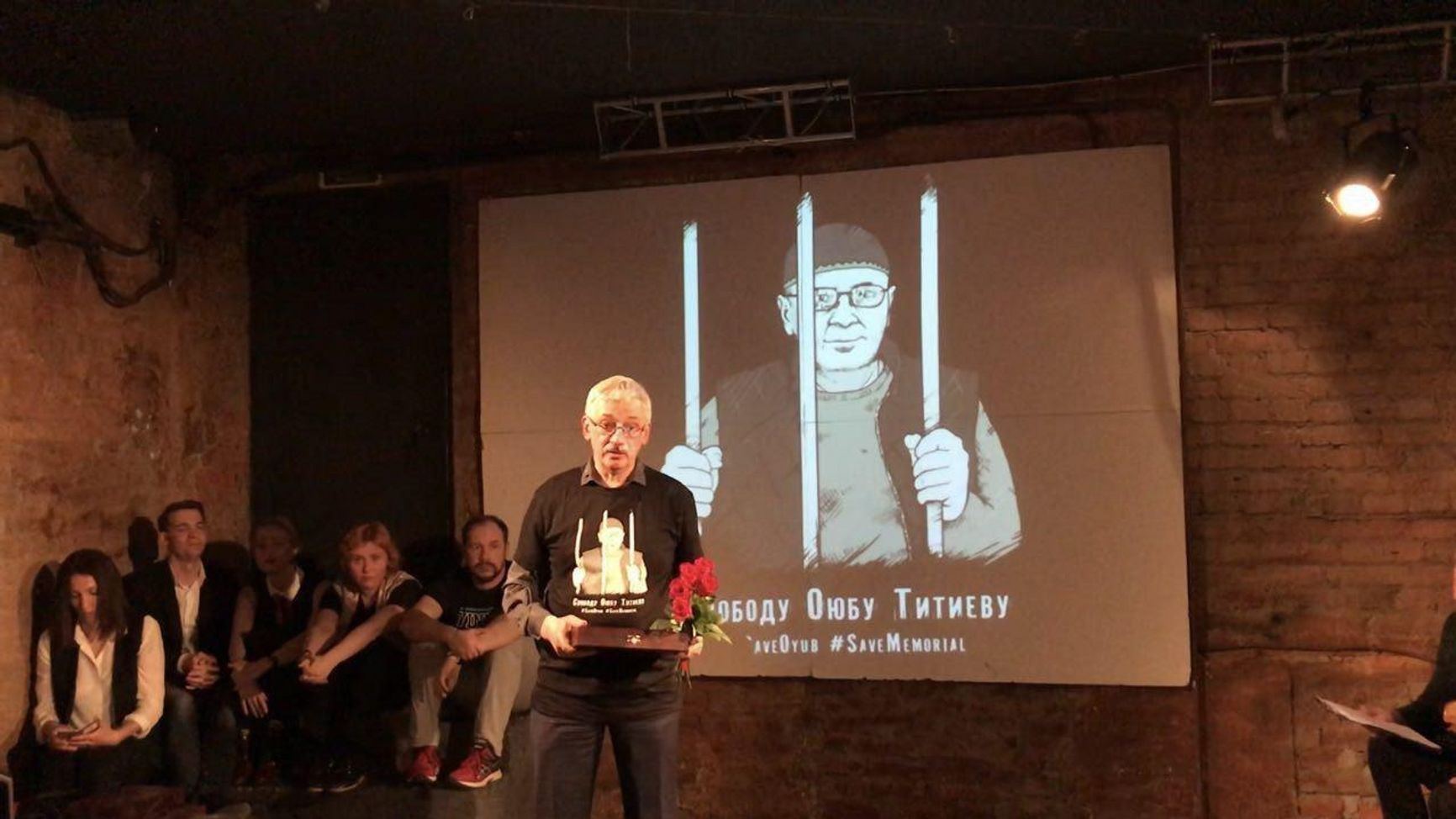 “Zhikharev,” second from right, at a 2018 award ceremony honoring Oyub Titiev, the then-incarcerated head of the Chechen chapter of the Memorial human right organization.