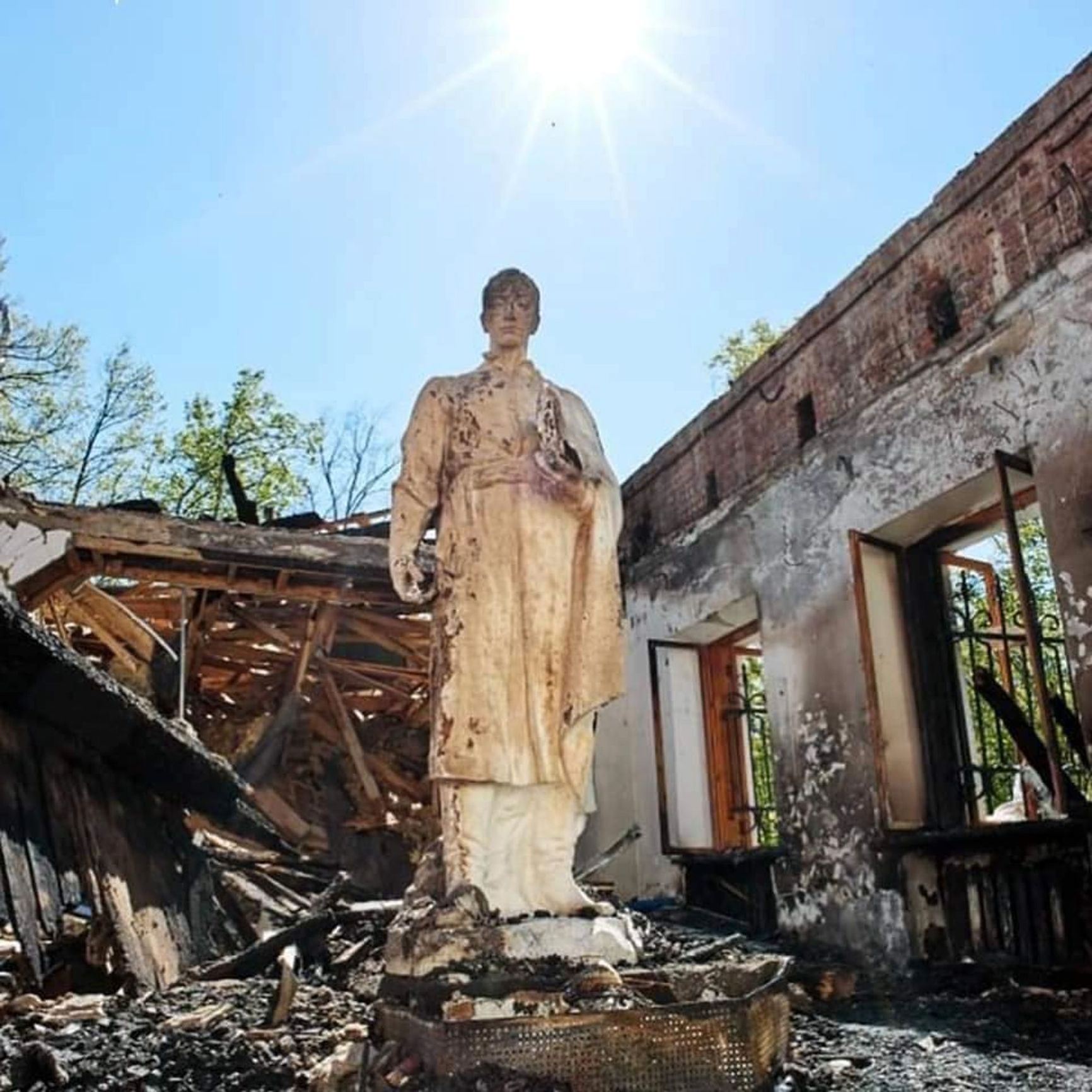 The statue of Hryhorii Skovoroda after the missile attack on the museum