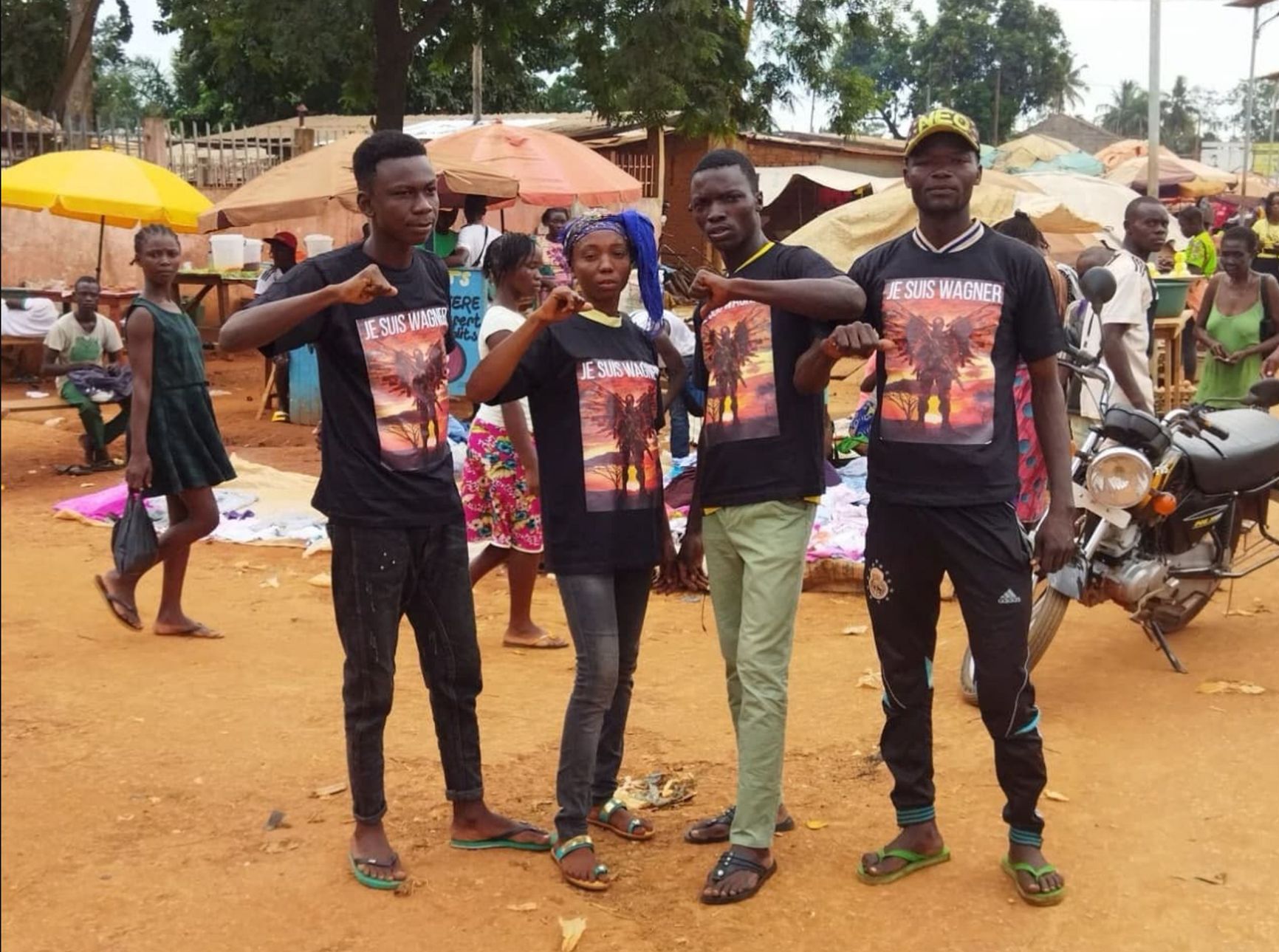 A group of Central African Republic residents wearing “Je suis Wagner” T-shirts