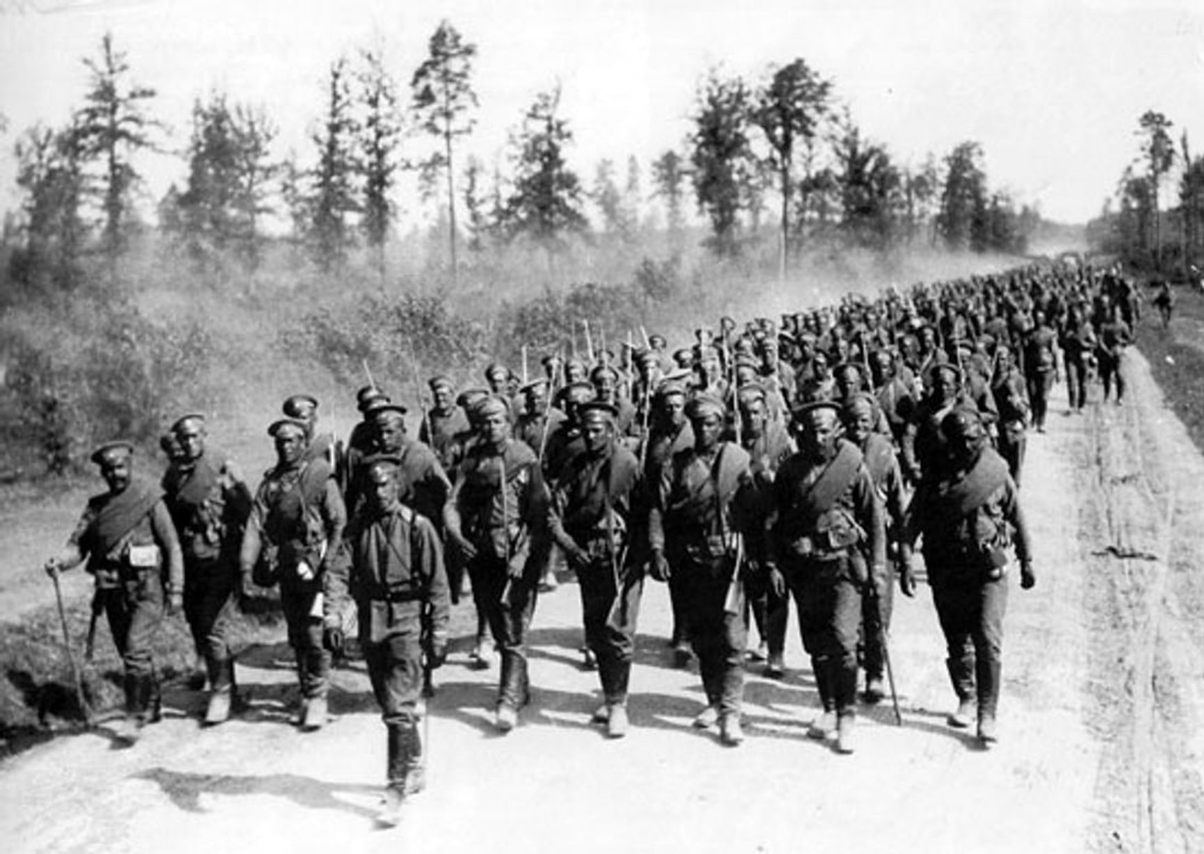 Russian infantry marching on a road in Poland. Early stage of WWI, 1914