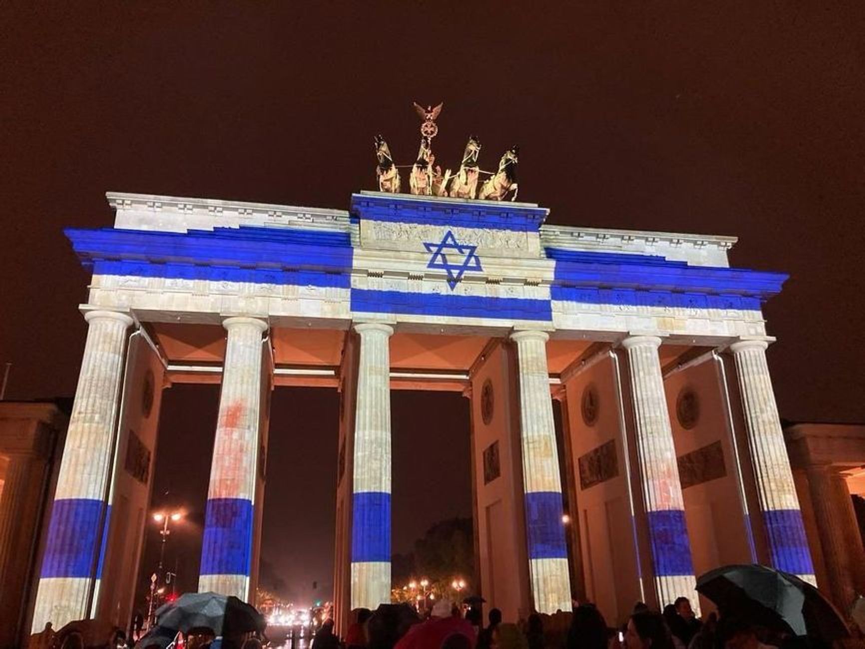 The Brandenburg Gate in Berlin lights up with the Israeli flag, October 7, 2023.