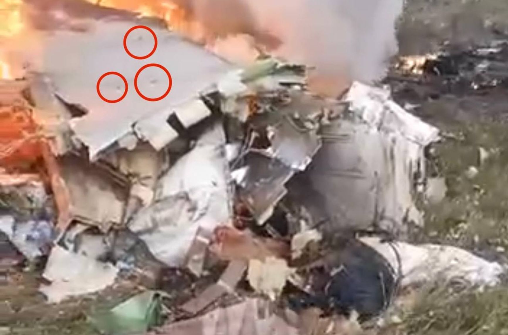Traces of what is believed to be air defense missile fragments on the wreckage of Prigozhin's jet