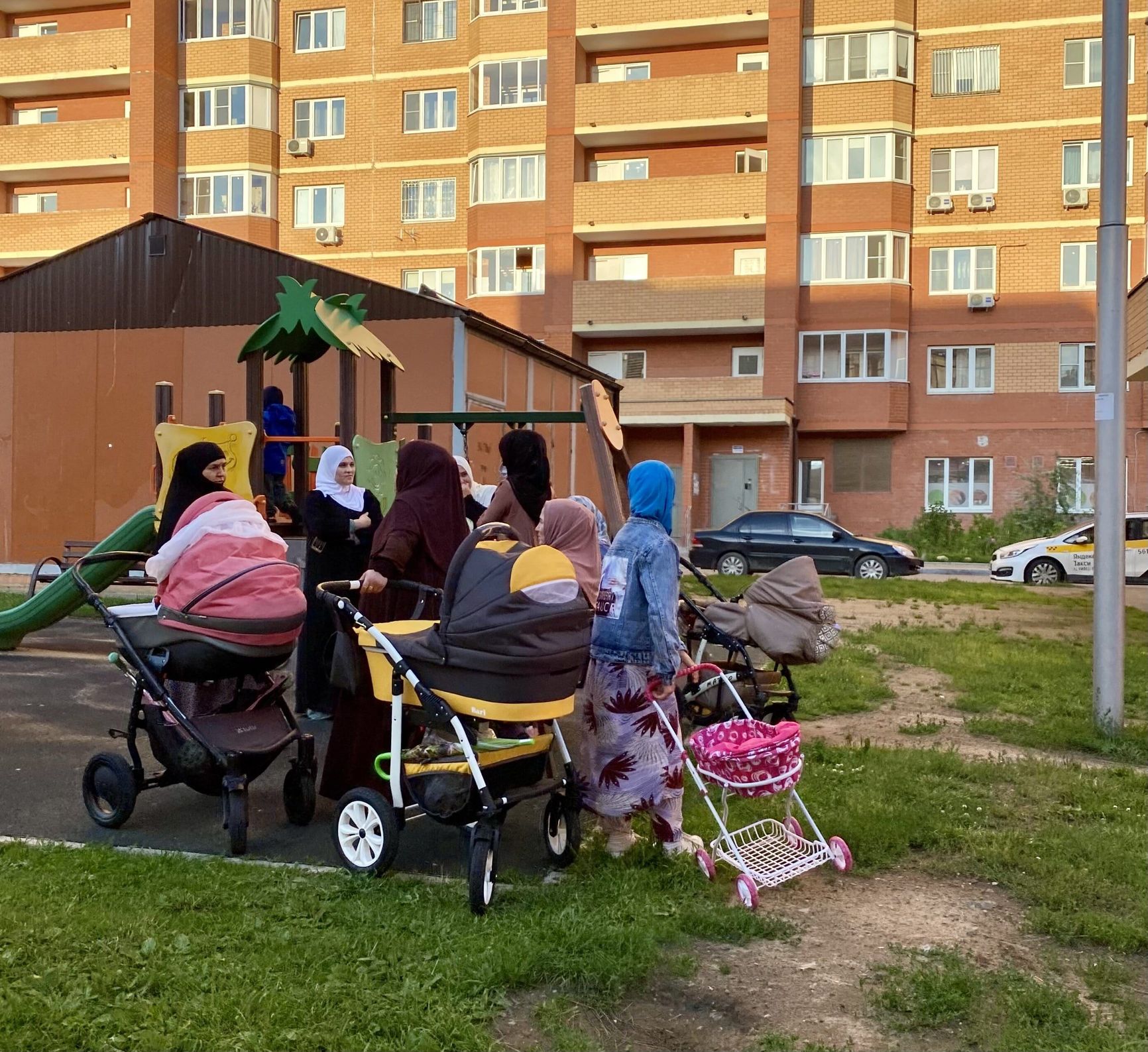 Residents of the Yuzhny Microdistrict at a playground